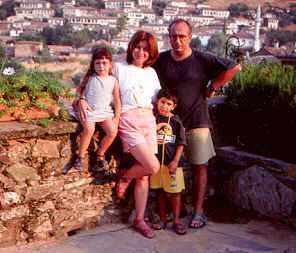 The Nişanyan family in 2001, the village behind them